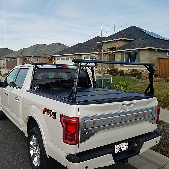 A few pics of a sport rack with folding tonneau cover ...