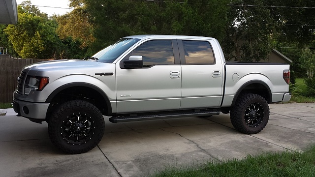 Silver ford f150 with black rims #3