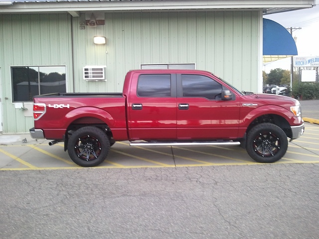 Red ford f150 with black rims #3