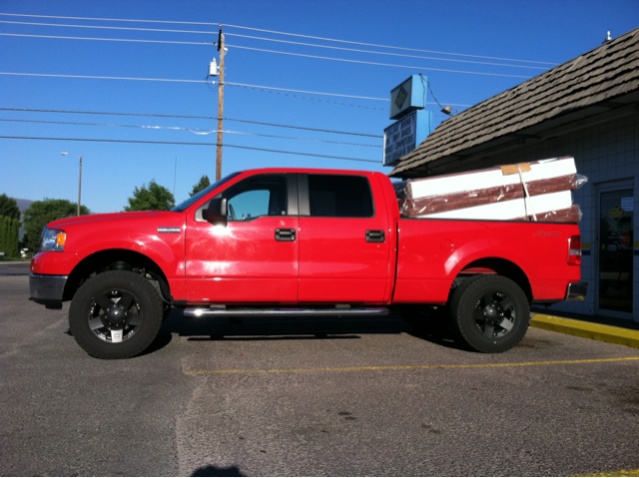 Red ford f150 with black rims #2