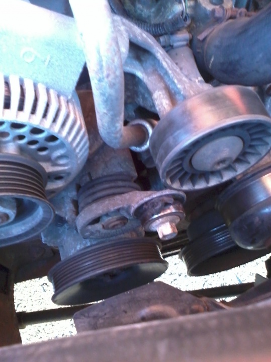 Replacing tensioner deals pulley ford f150